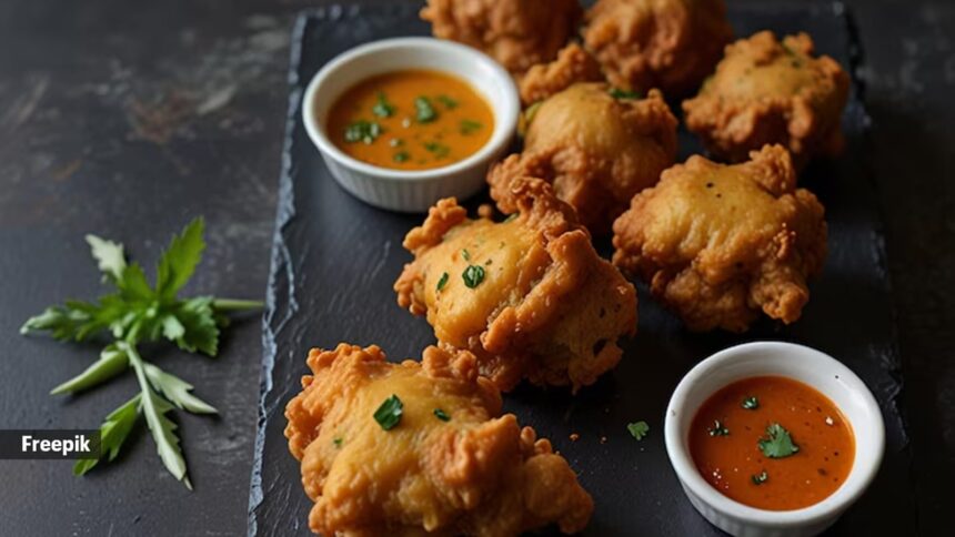 There's just something right about the sizzle of pakoras frying while rain taps on the roof.
