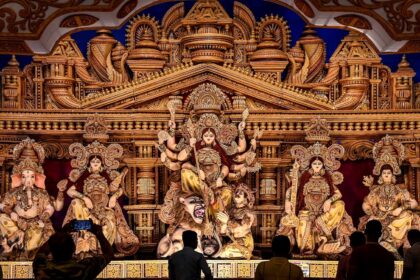 Devotees visit a pandal amid Durga Puja festivities, in Nadia, West Bengal, Saturday, Oct 5, 2024. (PTI Photo)