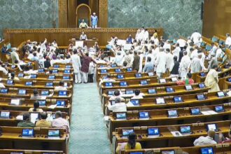 Opposition MPs protest in the Lok Sabha during the Monsoon session of Parliament