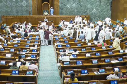Opposition MPs protest in the Lok Sabha during the Monsoon session of Parliament