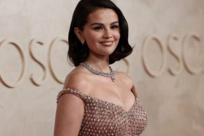 Selena Gomez poses on the red carpet during the Oscars arrivals at the 97th Academy Awards in Hollywood, Los Angeles, California