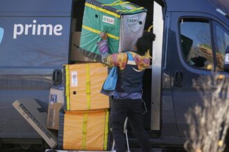 Amazon invests over $1 billion to raise employee pay and cuts healthcare costs