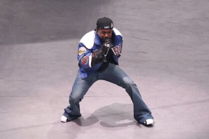 Kendrick Lamar wearing bootcut jeans