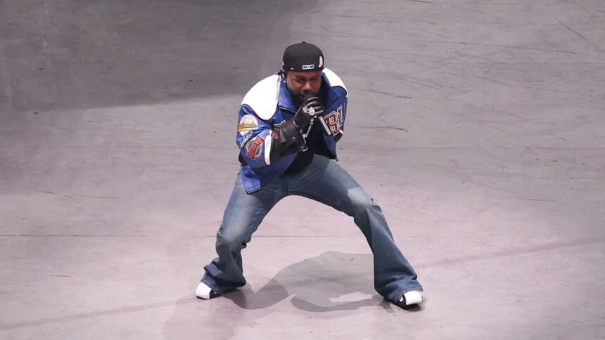 Kendrick Lamar wearing bootcut jeans