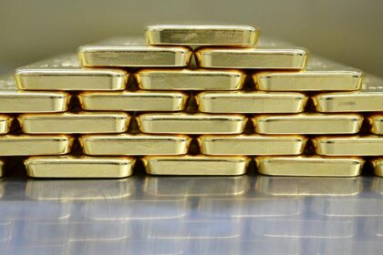 Gold has fallen from record highs in profit bookings, and worries about US government closure