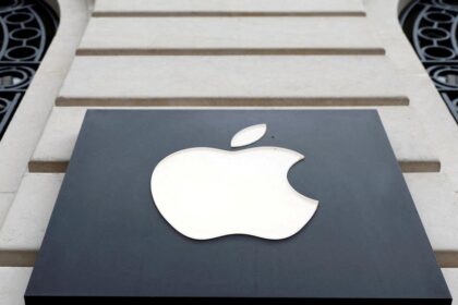 Apple is pushing India to revise its tax laws, which it says will hinder its business expansion, people familiar with the matter say.
