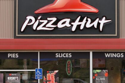 Pizza Hut's parent company Yum Brands says it is considering selling the chain