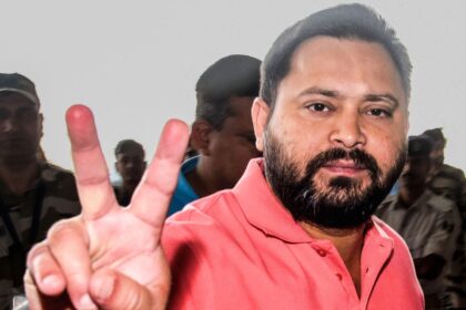 RJD leader Tejashwi Yadav shows the victory sign during the final day of campaigning ahead of the second phase of the Bihar assembly elections. (ANI Photo)