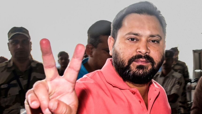 RJD leader Tejashwi Yadav shows the victory sign during the final day of campaigning ahead of the second phase of the Bihar assembly elections. (ANI Photo)