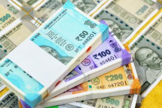 The rupee depreciated by 8 paise to close at Rs 89.98 against the US dollar.