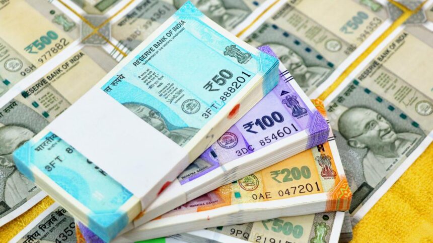 The rupee depreciated by 8 paise to close at Rs 89.98 against the US dollar.