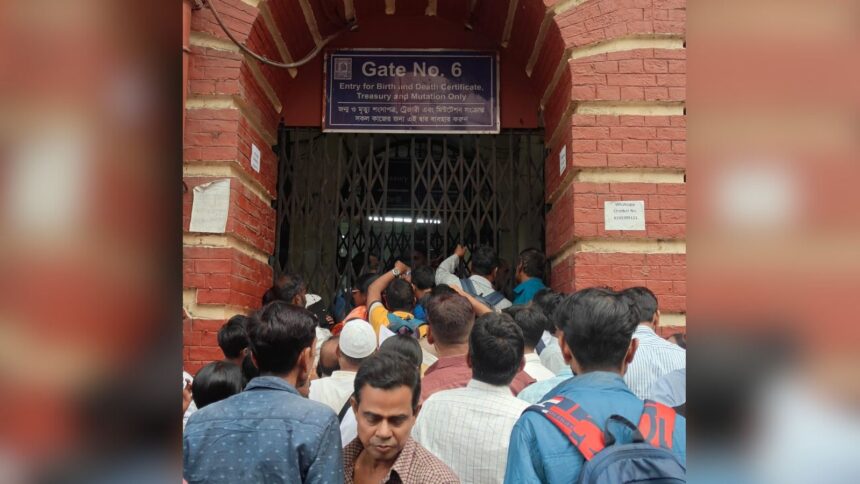 Outside gate number 6 of the historical Kolkata Municipal Corporation (KMC) building, which leads to the birth and death registration wing, two long, serpentine queues of people have formed at 10am.