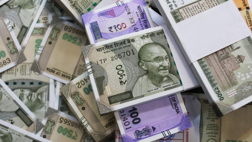 The rupee plunged by 50 paise to settle near an all-time low of Rs 90.84 against the US dollar.