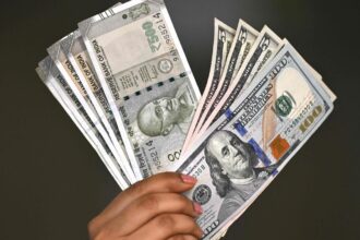 The rupee appreciated by 7 paise to close at Rs 90.87 against the US dollar.