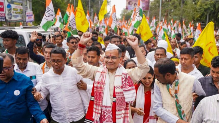 Assam Congress chief and the party's candidate from Jorhat constituency Gaurav Gogoi greeting supporters during his nomination rally ahead of the Assam Assembly elections. (PTI Photo)