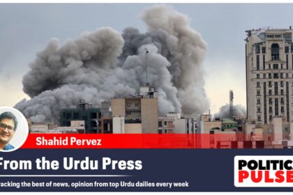 A plume of smoke rises after a strike in Tehran, Iran