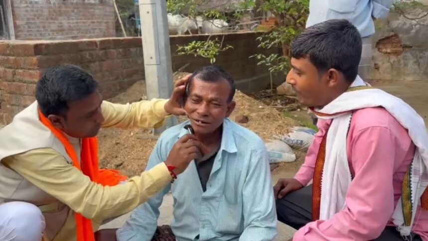 BJP’s Dubrajpur MLA Anup Kumar Saha takes on the role of a barber while on the campaign trail. (Express Photo)