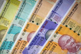 The rupee fell to a record low of 96.47 rupees against the US dollar in intraday trading.