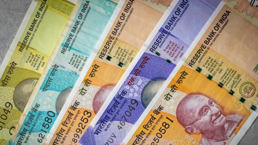 The rupee fell to a record low of 96.47 rupees against the US dollar in intraday trading.