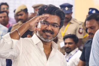 Tamilaga Vettri Kazhagam (TVK) chief and candidate from the Perambur constituency, Vijay, celebrates after winning in the Tamil Nadu Assembly elections results, in Chennai, Monday, May 4, 2026. (PTI Photo)