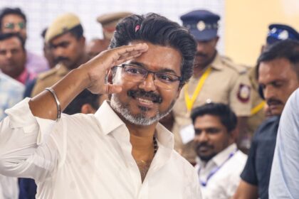 Tamilaga Vettri Kazhagam (TVK) chief and candidate from the Perambur constituency, Vijay, celebrates after winning in the Tamil Nadu Assembly elections results, in Chennai, Monday, May 4, 2026. (PTI Photo)