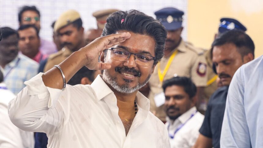 Tamilaga Vettri Kazhagam (TVK) chief and candidate from the Perambur constituency, Vijay, celebrates after winning in the Tamil Nadu Assembly elections results, in Chennai, Monday, May 4, 2026. (PTI Photo)