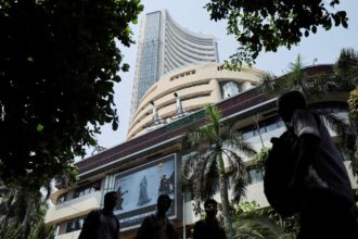 Stock markets fall in early trading as tensions between the US and Iran escalate and oil prices rise