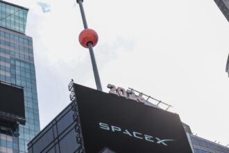 Wall Street ends higher as SpaceX market debut dominates