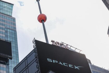 Wall Street ends higher as SpaceX market debut dominates