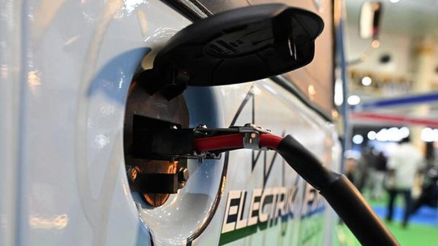 Why are auto companies opposing Delhi's revised electric vehicle policy?