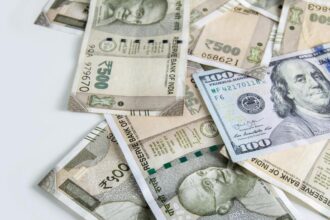 The rupee appreciated by 14 paise to close at Rs 95.27 against the US dollar.