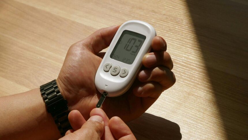 Continuous glucose monitor showing blood sugar levels