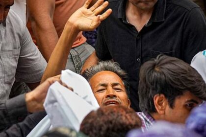 Activist Sonam Wangchuk, who has been on an indefinite hunger strike for 21 days, waves as he is shifted to a hospital from Jantar Mantar, in New Delhi. (PTI Photo)